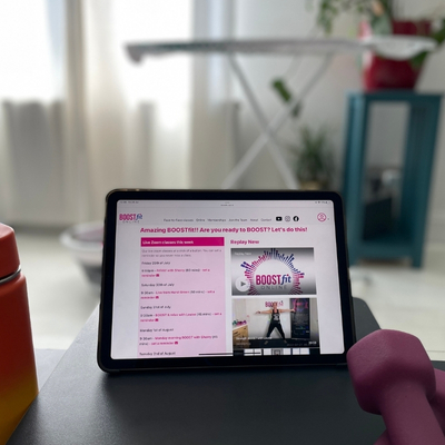 boostfit online training image showing exercise class on PC