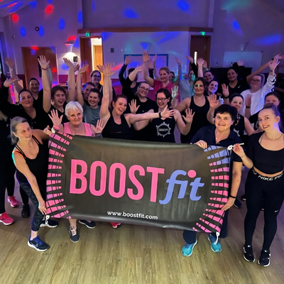find a boostfit training class showing a group of happy trainers image