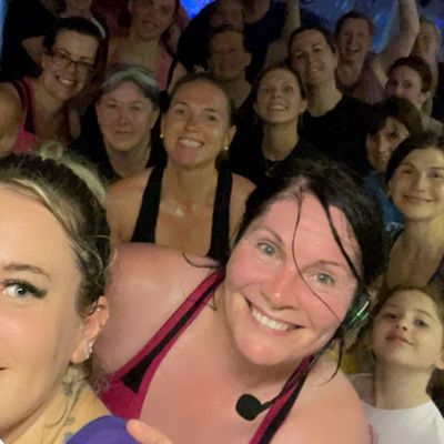 photo of smiling faces at an exercise class